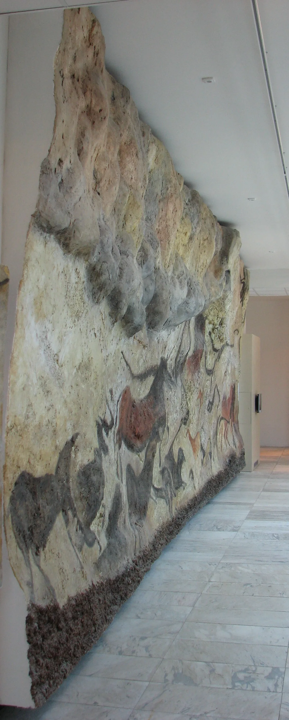 Painted animals on a cave wall at Lascaux